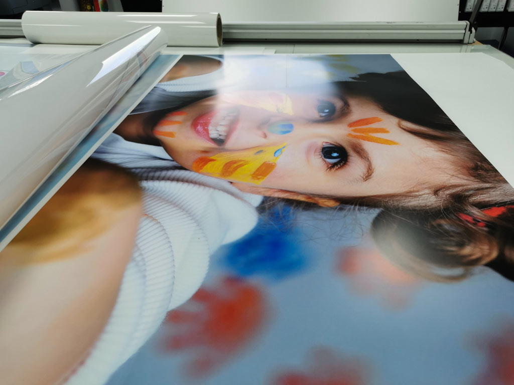 Protective laminates for prints